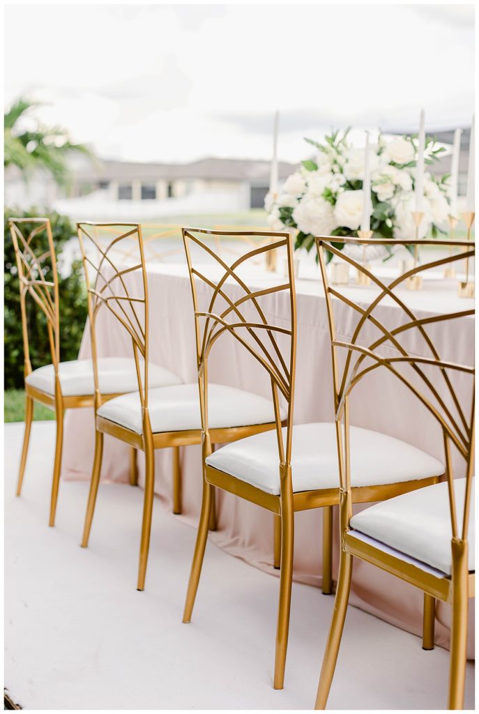 gold chairs at table